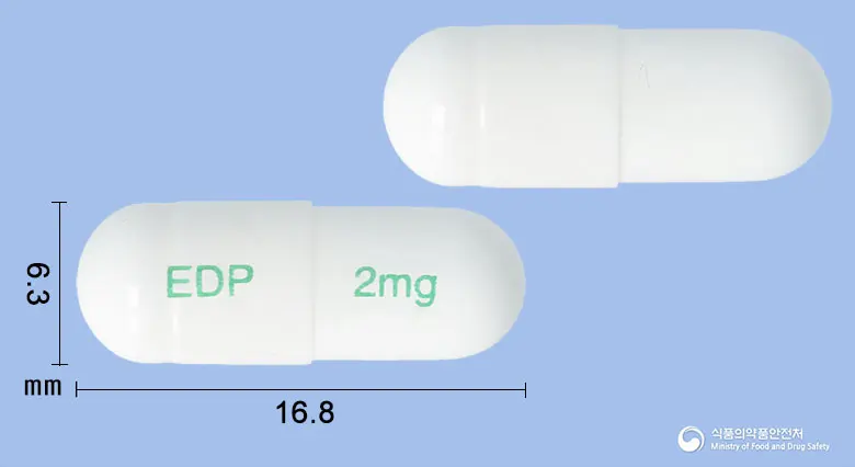 폴시브캡슐2밀리그램(폴마콕시브) 앞뒤 사진 (흰색 캡슐, 각인 EDP 2mg)