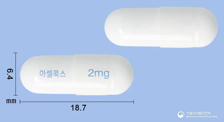 아셀콕스캡슐2밀리그램(폴마콕시브) 앞뒤 사진 (흰색 캡슐, 각인 아셀콕스 2mg)