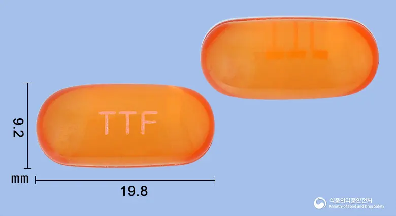 토탈플루연질캡슐 앞뒤 사진 (주황색·투명 캡슐, 각인 TTF)