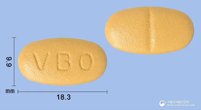 임팩타민원스정 앞뒤 사진 (주황색 타원형, 각인 VBO)