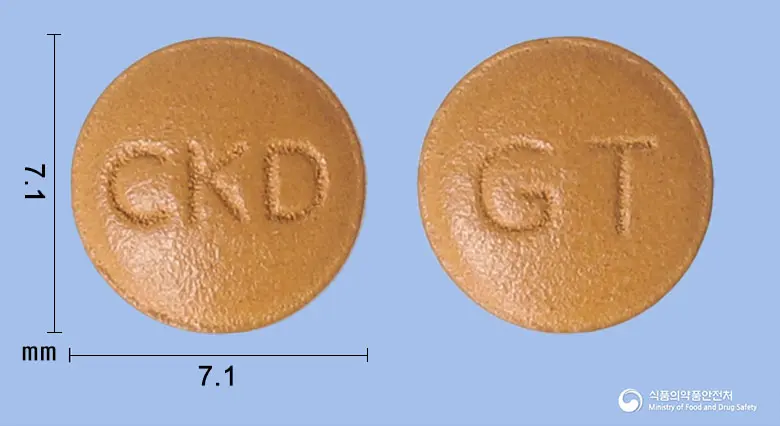 지텍정75밀리그램(육계건조엑스(16~26→1)) 앞뒤 사진 (주황색 원형, 각인 CKD / GT)