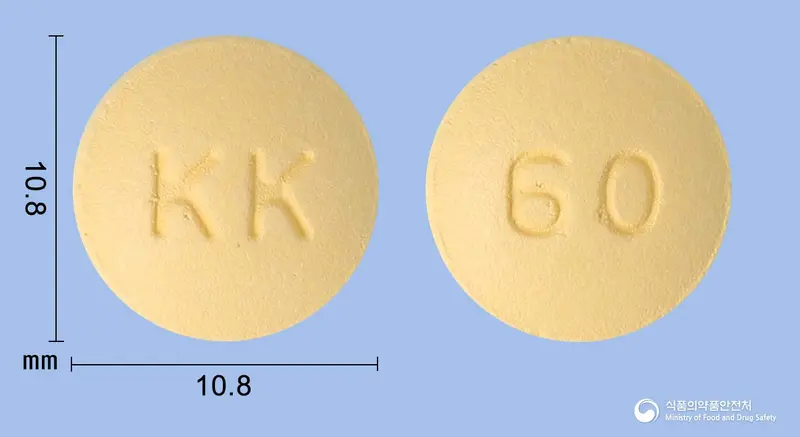 제독사반정60밀리그램(에독사반베실산염수화물) 앞뒤 사진 (주황색 원형, 각인 KK / 60)