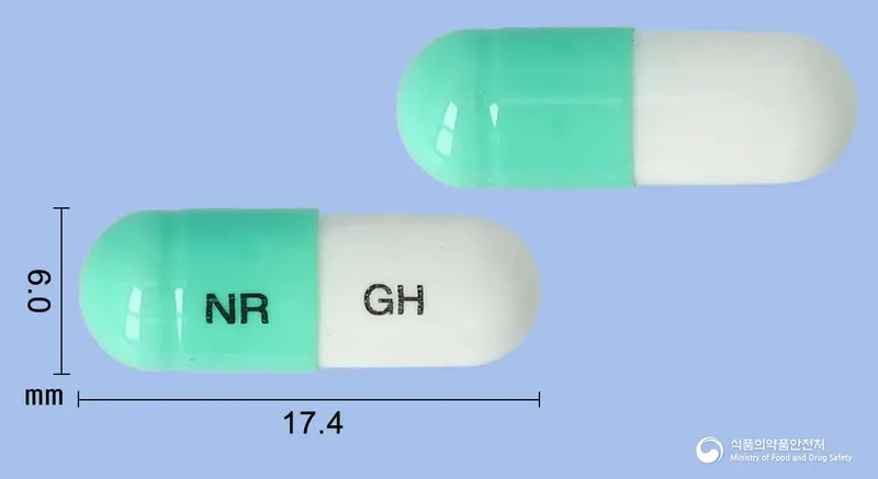 노량캡슐 앞뒤 사진 (초록색 캡슐, 각인 NR GH)