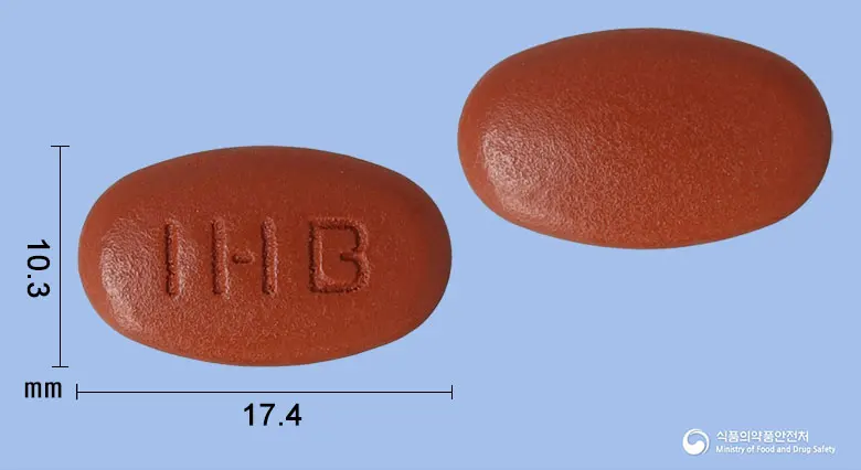 맥스타민메가맥스정 앞뒤 사진 (갈색 타원형, 각인 IHB)