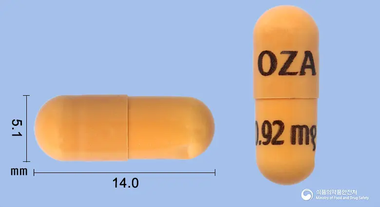 제포시아캡슐0.92밀리그램(오자니모드염산염) 앞뒤 사진 (주황색 캡슐, 각인 OZA 0.92mg)