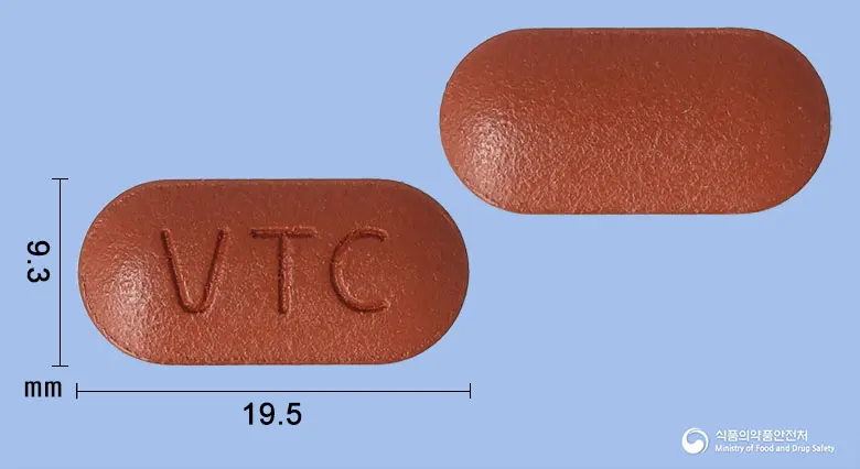비타비케어정 앞뒤 사진 (갈색 장방형, 각인 VTC)