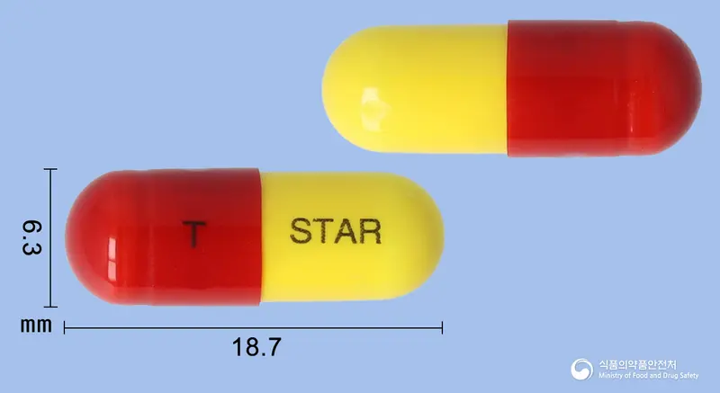 티엔프로스타캡슐 앞뒤 사진 (빨간색 캡슐, 각인 T STAR)