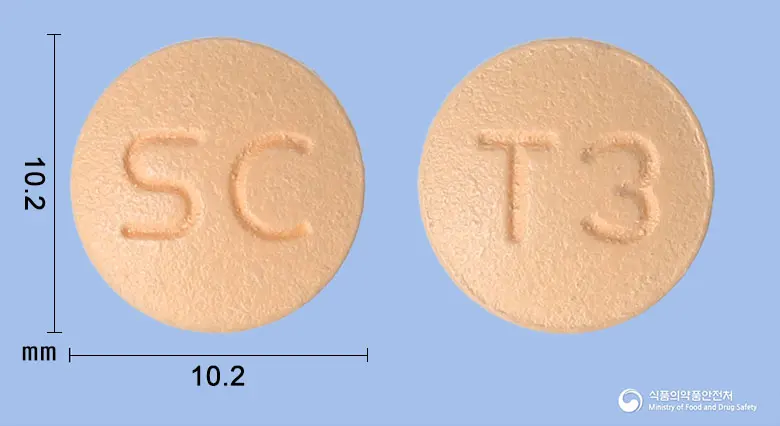 자누글루정100밀리그램(시타글립틴염산염수화물) 앞뒤 사진 (분홍색 원형, 각인 SC / T3)