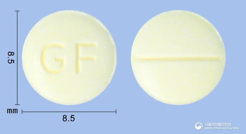 쓰담정200밀리그램(트리메부틴말레산염) 앞뒤 사진 (연두색 원형, 각인 GF)