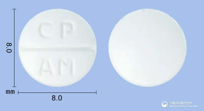 씨엠지암브록솔정(암브록솔염산염) 앞뒤 사진 (흰색 원형, 각인 CP AM)