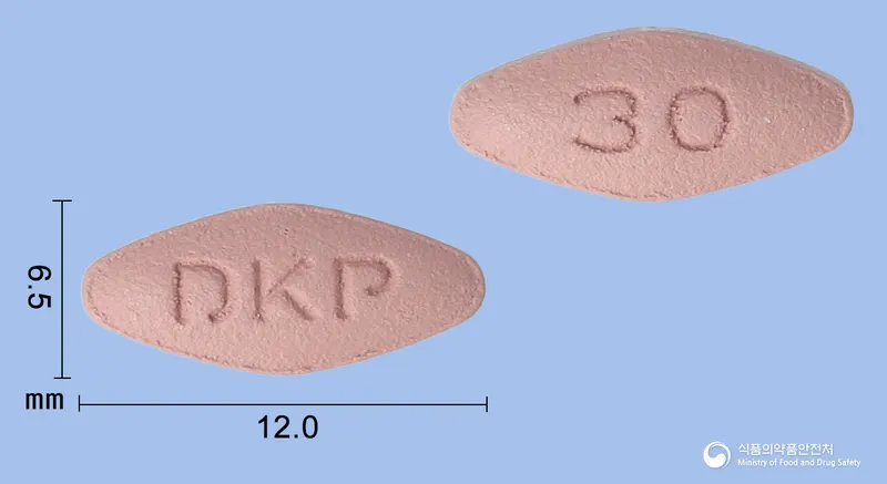 오테밀라정(아프레밀라스트) 앞뒤 사진 (분홍색 마름모형, 각인 DKP / 30)
