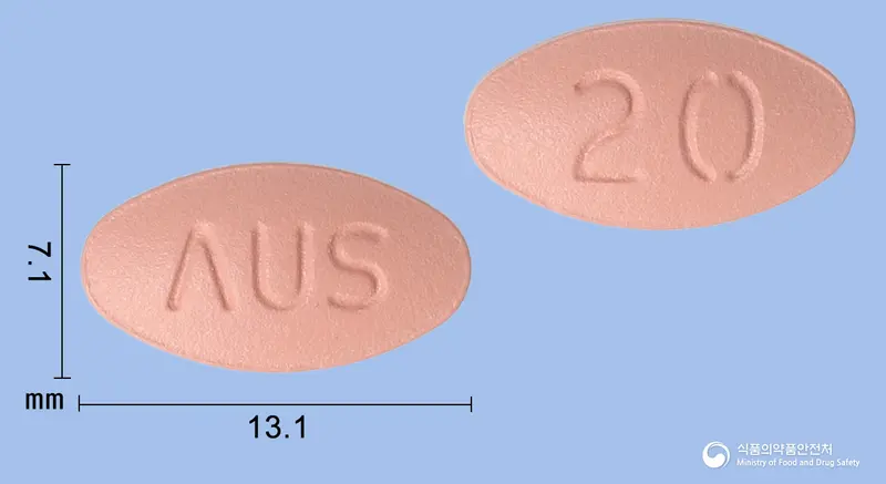 마빅스정20mg(메만틴염산염) 앞뒤 사진 (분홍색 타원형, 각인 ΛUS / 20)
