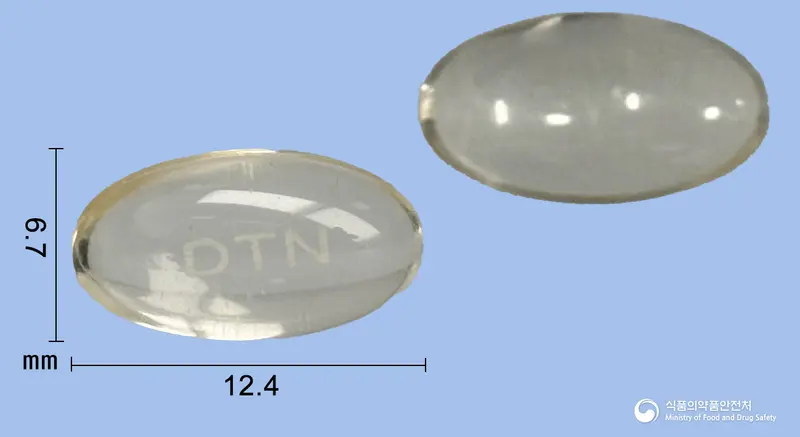 두타앤연질캡슐0.5mg(두타스테리드) 앞뒤 사진 (노란색·투명 캡슐, 각인 DTN)
