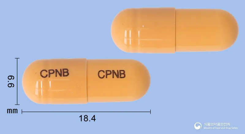 엔브레스캡슐 앞뒤 사진 (주황색 캡슐, 각인 CPNB CPNB)