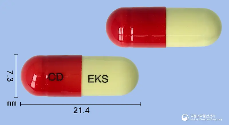 초당은교산캡슐 앞뒤 사진 (빨간색 캡슐, 각인 CD EKS)