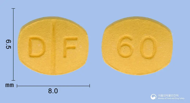 카나덴정60밀리그램(피마사르탄칼륨삼수화물) 앞뒤 사진 (노란색 타원형, 각인 D F / 60)