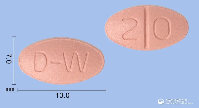 동화메만틴정20mg(메만틴염산염) 앞뒤 사진 (분홍색 타원형, 각인 D-W / 2 0)