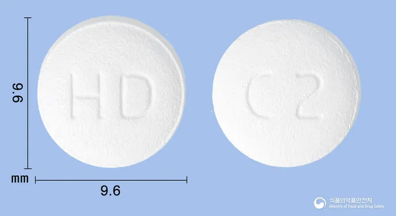 칸데바로정16/2.5mg(칸데사르탄실렉세틸,에스암로디핀베실산염) 앞뒤 사진 (흰색 원형, 각인 HD / C2)