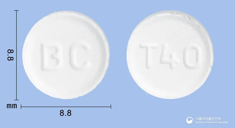 텔바로오디정40밀리그램(텔미사르탄) 앞뒤 사진 (흰색 원형, 각인 BC / T40)