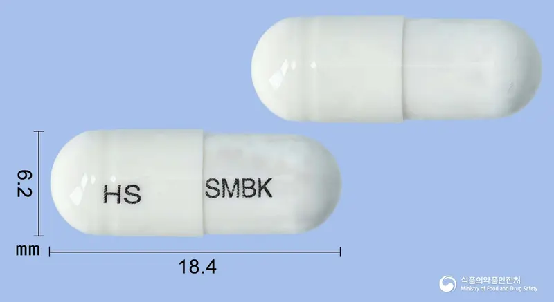 사카루스듀오캡슐 앞뒤 사진 (흰색 캡슐, 각인 HS SMBK)