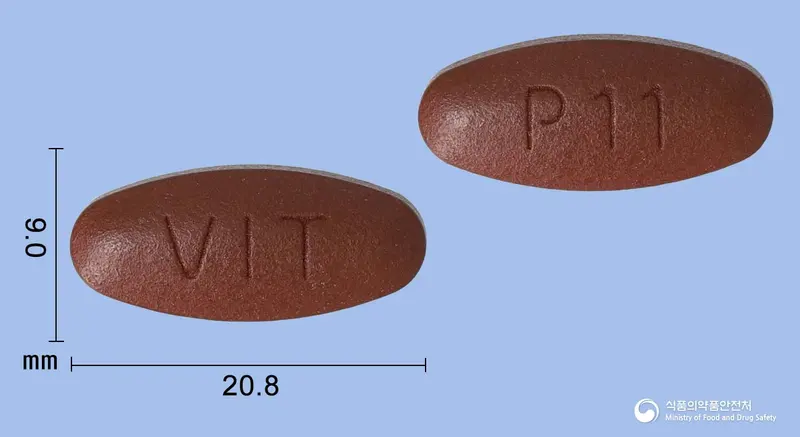 비타펄스정 앞뒤 사진 (갈색 타원형, 각인 VIT / P11)