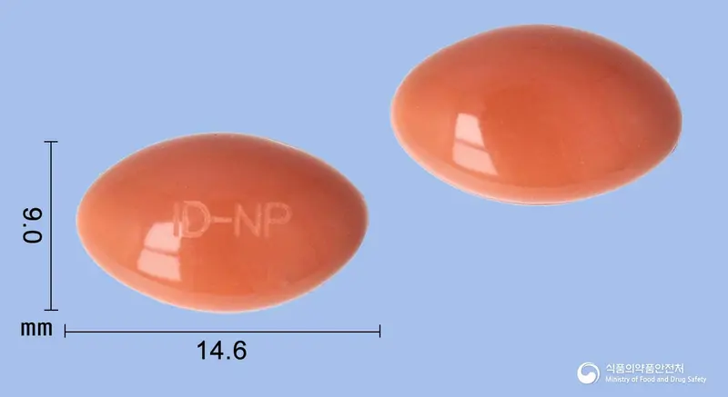 캐롤비노즈플러스연질캡슐 앞뒤 사진 (주황색 캡슐, 각인 ID-NP)