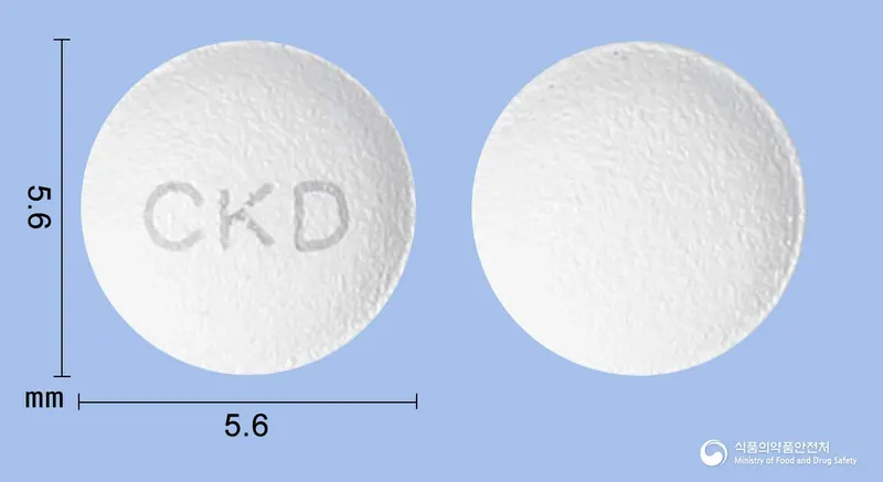 뉴로페질정3밀리그램(도네페질염산염일수화물) 앞뒤 사진 (흰색 원형, 각인 CKD)