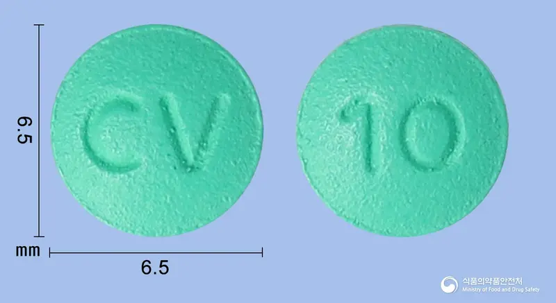 파모케어정(파모티딘) 앞뒤 사진 (초록색 원형, 각인 CV / 10)
