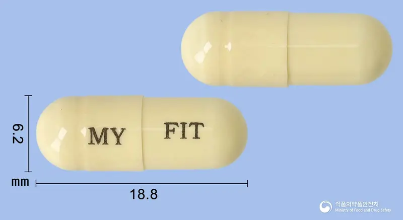 마이핏캡슐 앞뒤 사진 (노란색 캡슐, 각인 MY FIT)