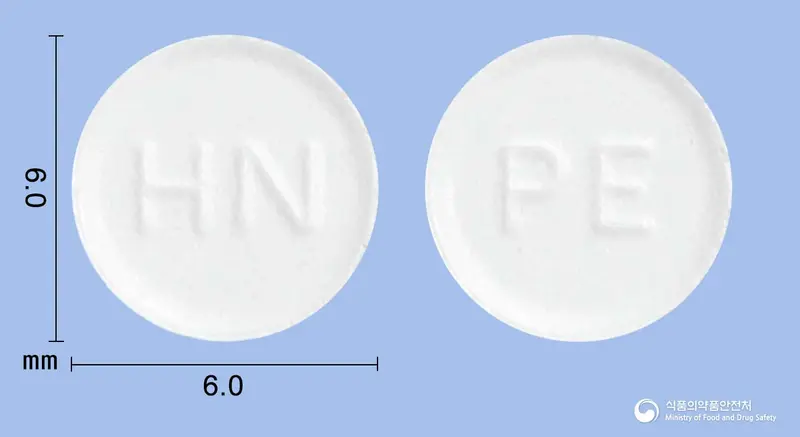 하나펜정(펠루비프로펜(미분화)) 앞뒤 사진 (흰색 원형, 각인 HN / PE)