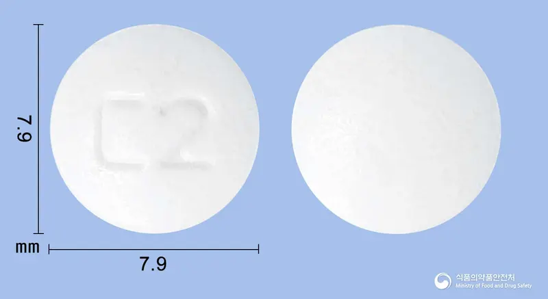 서카딘서방정2mg(멜라토닌) 앞뒤 사진 (흰색 원형, 각인 C2)